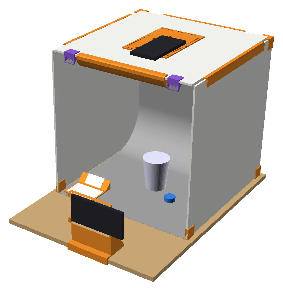 CAD render of a white foamboard photo booth on a plywood base, with orange printed corner brackets, a light bar on top, a phone cradle at the front and a sample object inside.